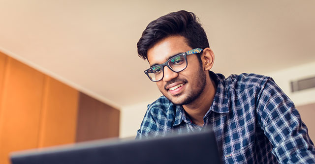 man on computer